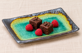 F28-M rectangular plate with brownie pieces and raspberries