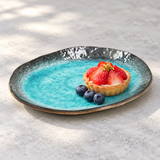 FDKN-4 turquoise ceramic plate with a fruit tart and berries