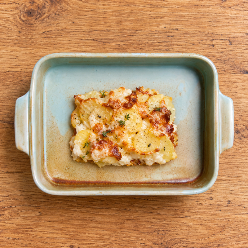 BK-2064 Fire Earth porcelain rectangular with handles with a potato gratin