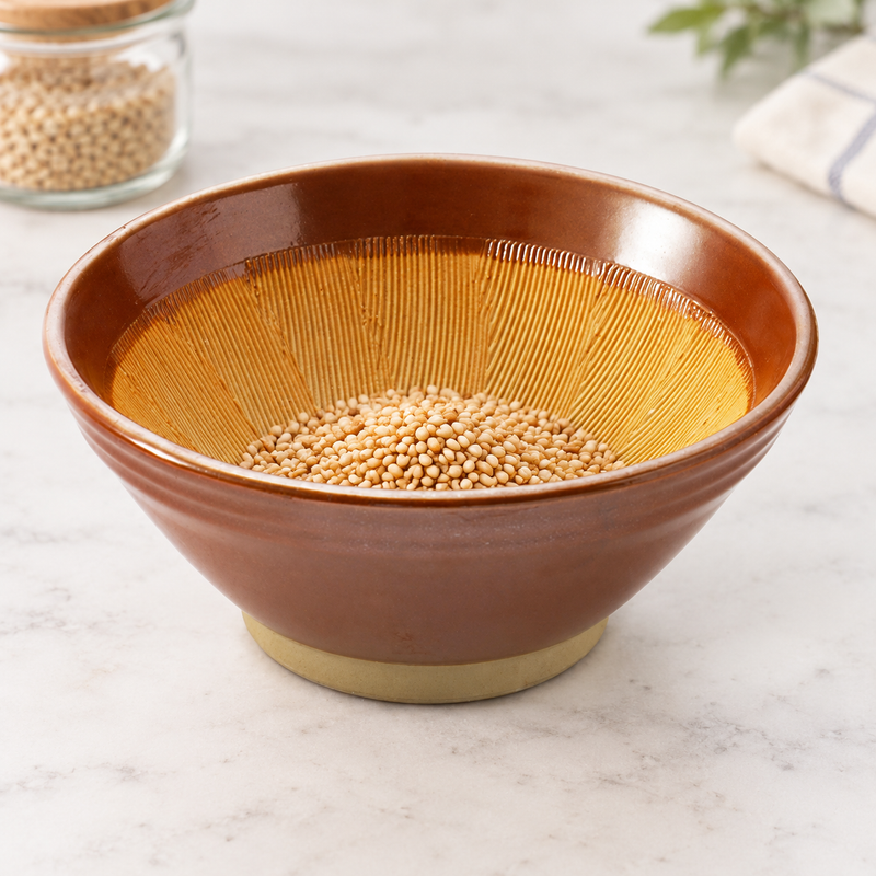 G56-K ridged grinding bowl with a modest portion of seeds ready for preparation
