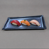 G5928-TK black porcelain rectangular plate with three nigiri, low frontal view