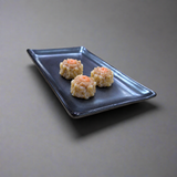 G5948-TK black porcelain rectangular plate with three small shumai, oblique view