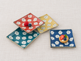 Four GY13-11S floral plates with a small fruit tart and berries