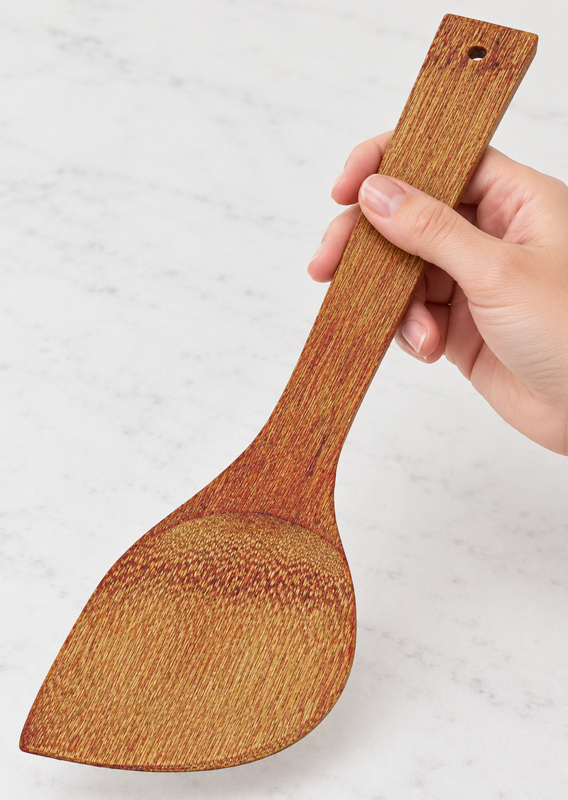 H38 spatula held to show its handle and working face