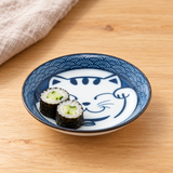 Blue Lucky Cat small dish with two cucumber maki pieces