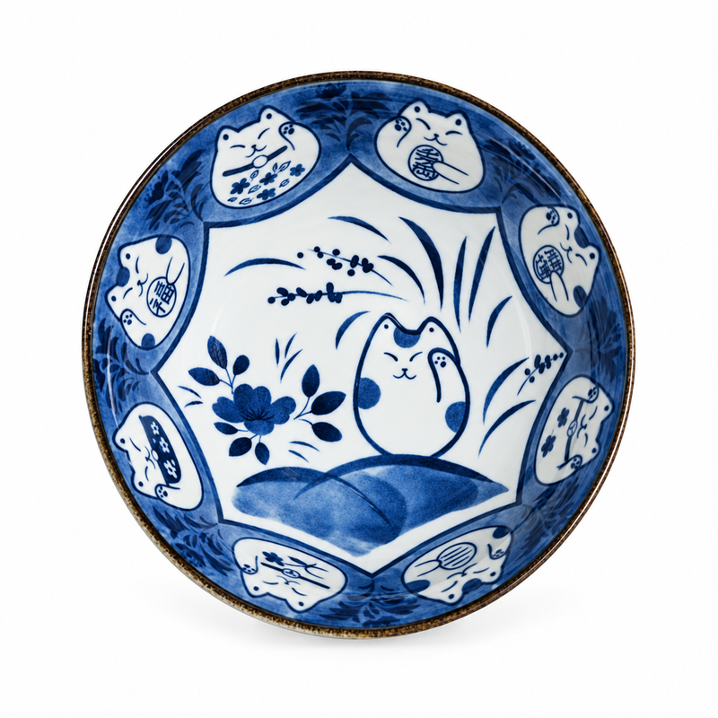 Overhead view of HB56-CT5 with lucky-cat medallions around the blue rim and a large raised-paw cat among botanical leaves inside.