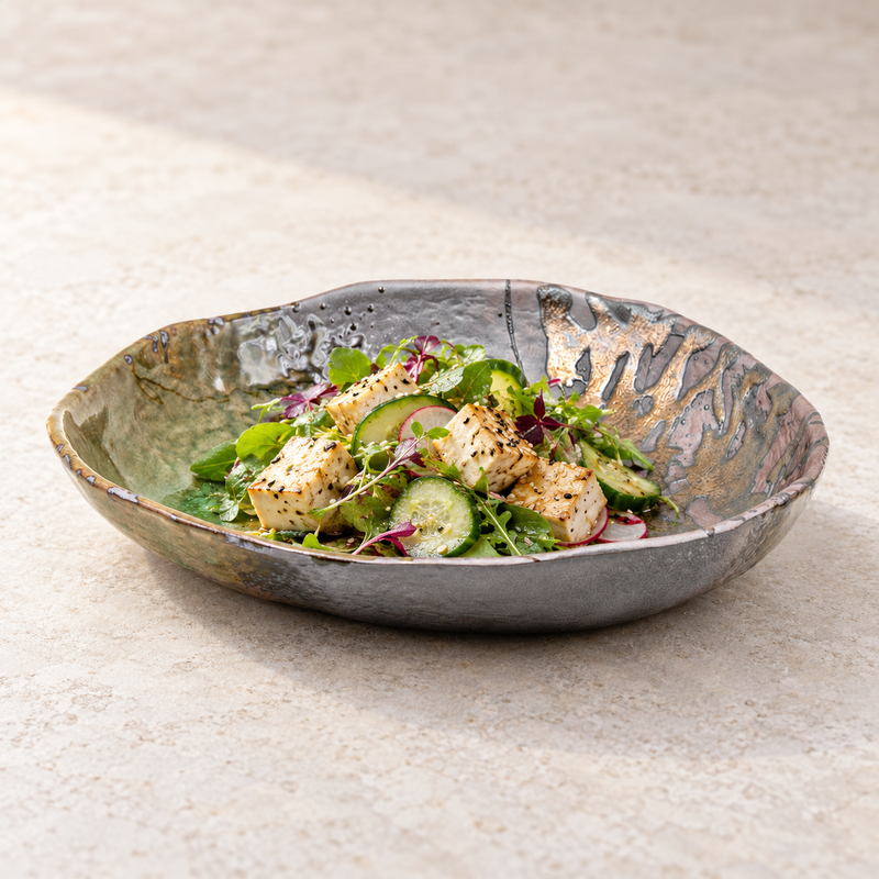 IM310-IK with a tofu salad on a light stone tabletop