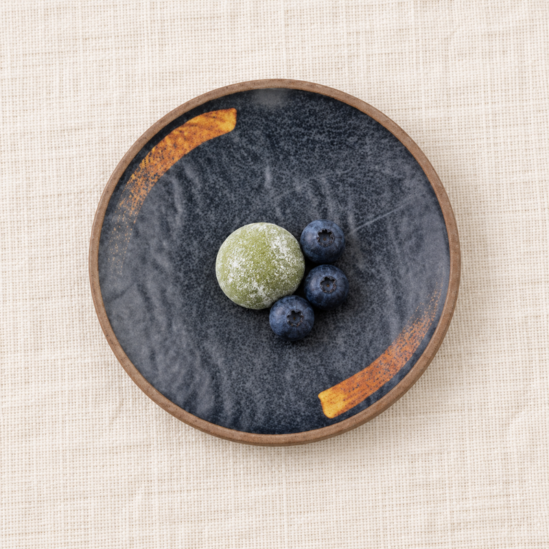 7-inch round melamine plate with mochi and berries