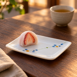JSQ506B-HM Rain Flower rectangular plate with strawberry mochi on a warm wood tea table