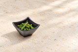Black square sauce dish with sesame green beans
