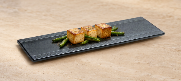 JX215-B black porcelain — a narrow stage for a composed serving
