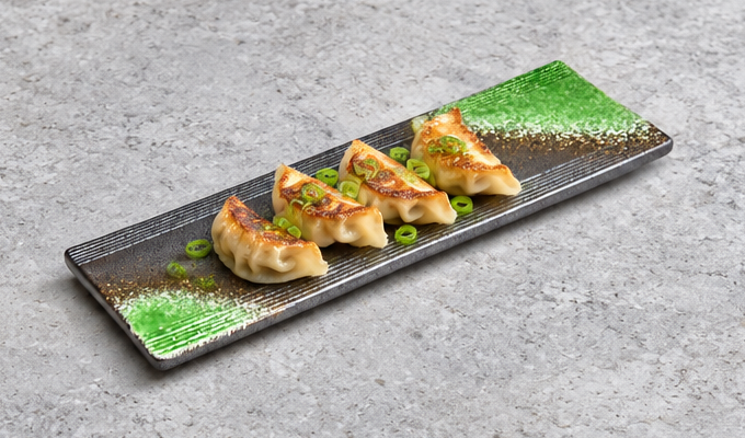 15"X5" Rectangular Porcelain Platter, Black/Green. Restaurant serving context.