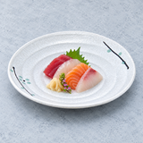 8.75"Dx1.25"H Porcelain Plate, White. Serving suggestion.