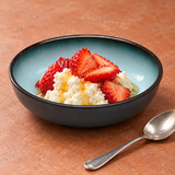 5.5"Dx1.75"H Porcelain Bowl, Reactive Glaze - Blue/Black, Styled view