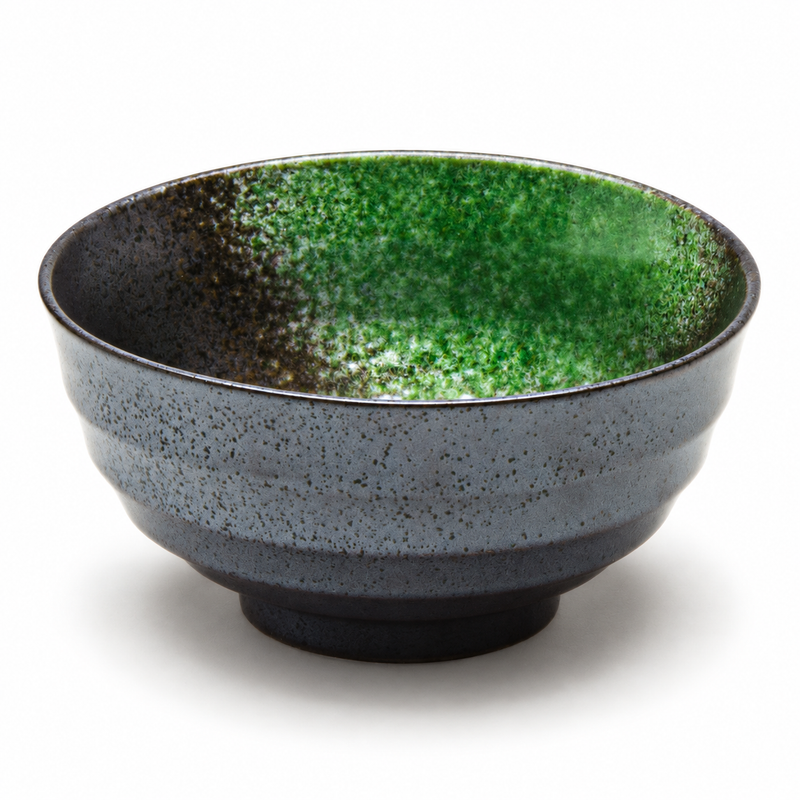 Deep black and green porcelain bowl with a speckled surface, broad exterior bands and a short circular foot.