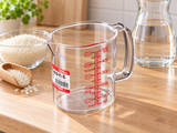 Empty K159 measuring cup ready for ingredient preparation