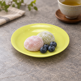 K382-2 green round plastic plate with mochi and berries