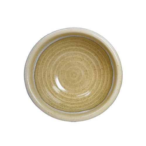 Overhead view of the yellow-tan mini bowl with concentric interior rings and a pale cream rim.