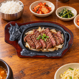 NSP-06 steak plate with serving base — serving suggestion