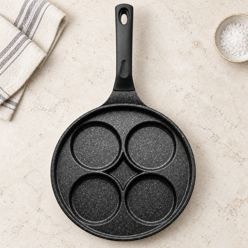 Four-well marble egg pan — A low-profile pan with a long handle