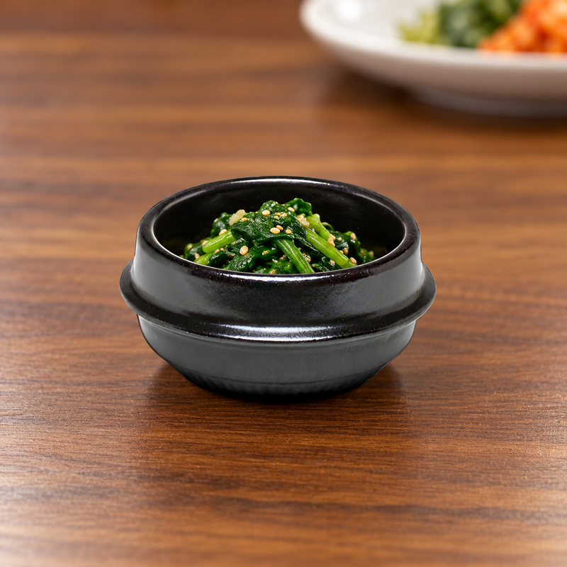 DRC-117 black ceramic side bowl with seasoned greens