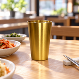 SSG-JQ-WC-16 gold water cup at a daytime Korean restaurant table
