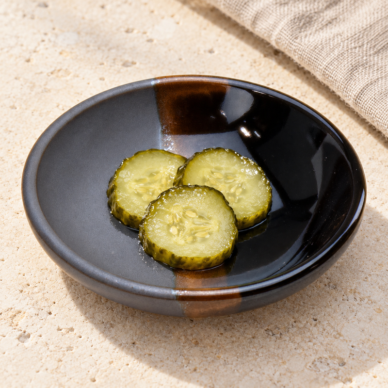 KP21-C brown-band dish serving a small cucumber-pickle portion
