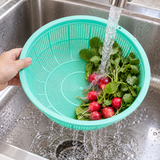 Green L3 mesh bowl with radishes and herbs in a produce preparation setting