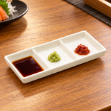 M0227 white three-compartment dish with modest individual dipping sauces; serving suggestion