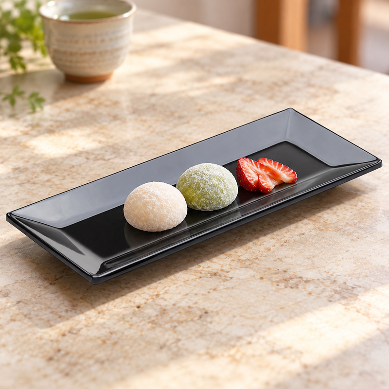 M0399-BK black melamine plate with petite mochi sweets and strawberries