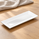 White rectangular melamine dish in a natural tabletop setting