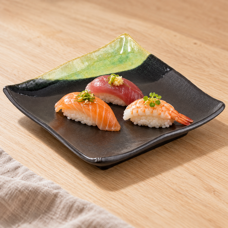 7″ Dark Brown & Green Ceramic Square Plate with a small sushi selection