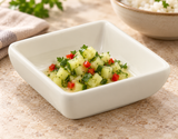 M334 ivory square melamine sauce dish with diced cucumber relish.