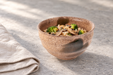 M543-C: Rice with mushrooms and broccoli on gray stone.
