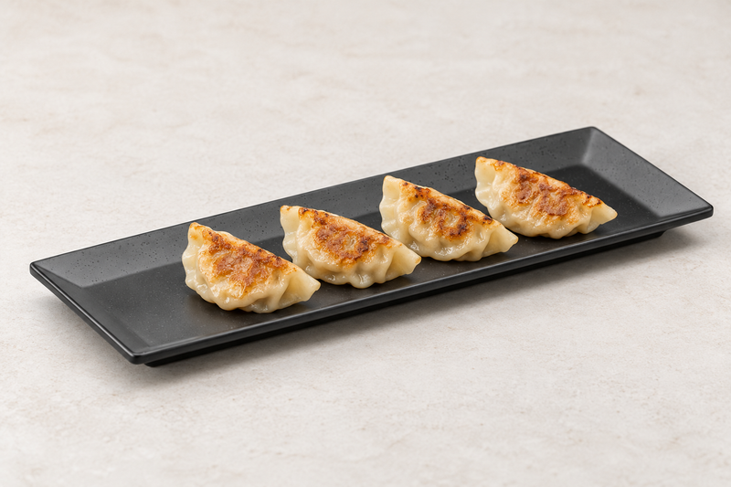 YG-5212MB matte black rectangular platter with four gyoza