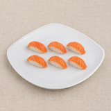 MELAMINE-SQUARE-PLATE-LG-12-WHITE white melamine square plate with six small salmon nigiri in two spaced rows, each approximately 2 inches long