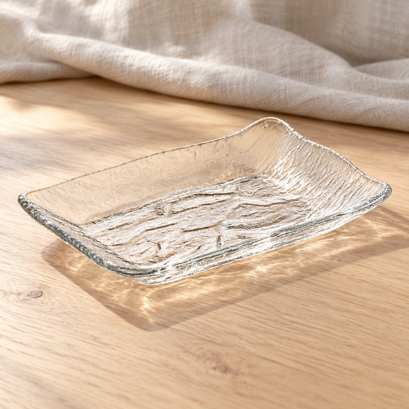 Clear rectangular glass dish in a natural tabletop setting