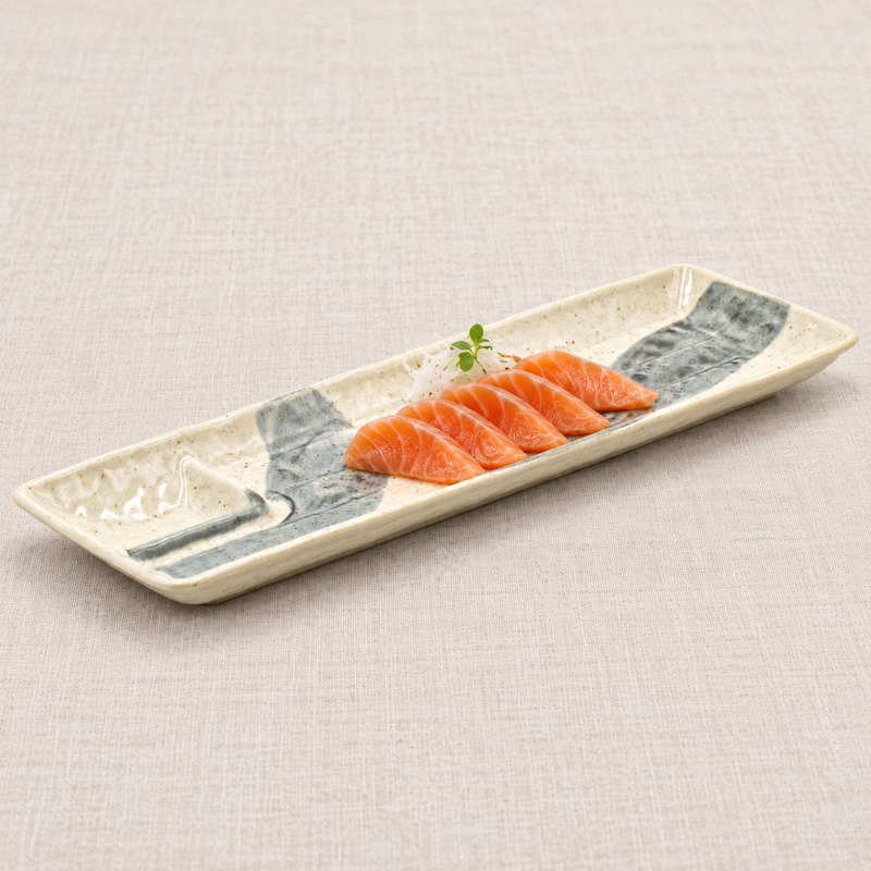Beige and blue-gray rectangular ceramic platter with salmon sashimi