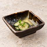 MP23-2 square sauce dish with a small cucumber pickle portion