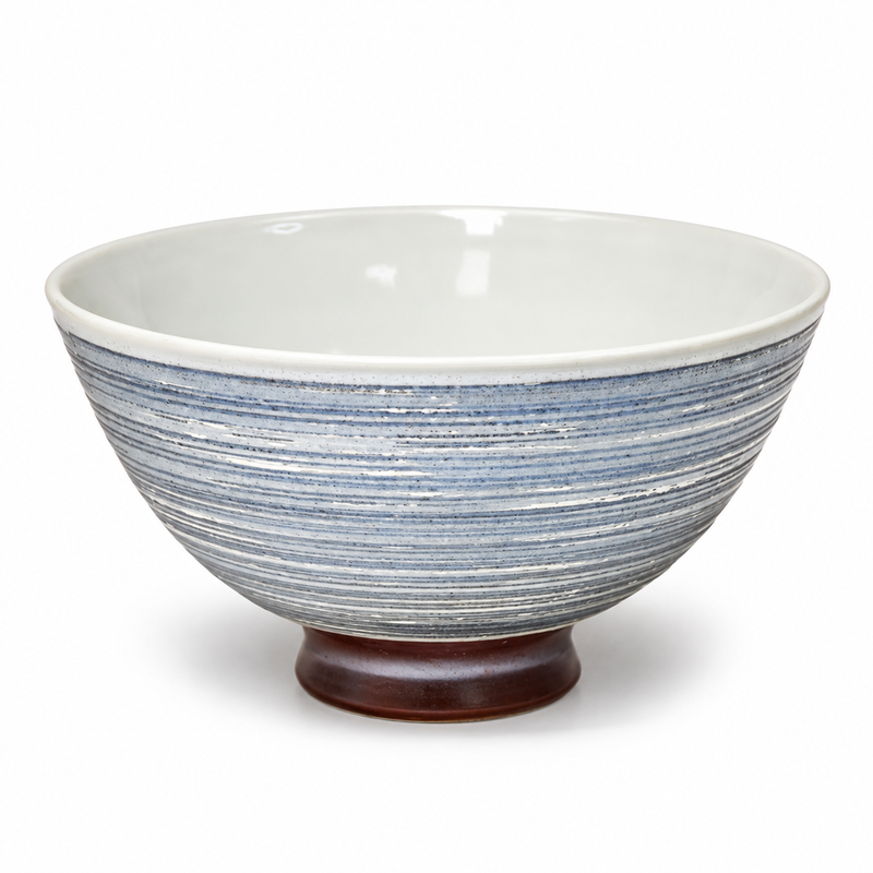 MT55-LBK ceramic bowl with a striped exterior, open interior, curved walls and distinct foot.