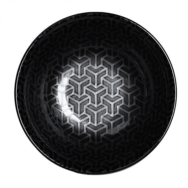 Black ceramic bowl with interlocking silver-gray geometric lines across the full interior and a dark rim.