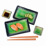 ORS6-LG green and black plates with nigiri and pickles, with soy in a companion dish