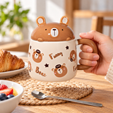 PC51-1 mug held by its handle with original character lid