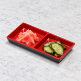 327-BR black and red serving piece with small pickled accompaniments. Serving suggestion.