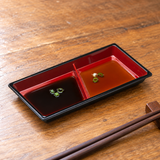 WO-12 black and red serving piece with two shallow sauce servings. Serving suggestion.