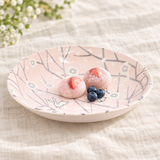 Pink rabbit and blossom round plate with two strawberry mochi and blueberries