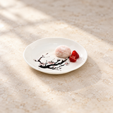 PT25-C white plum blossom plate with a small dessert serving