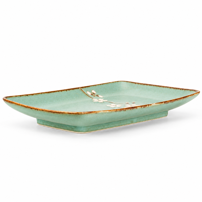 Empty green-blue MT28-HS floral plate with brown rim and low pedestal