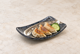 S27-AA: 7.25" x 4.75" Rectangular Ceramic Plate, Black, Brown. Restaurant serving context