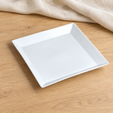White square plate in a natural tabletop setting